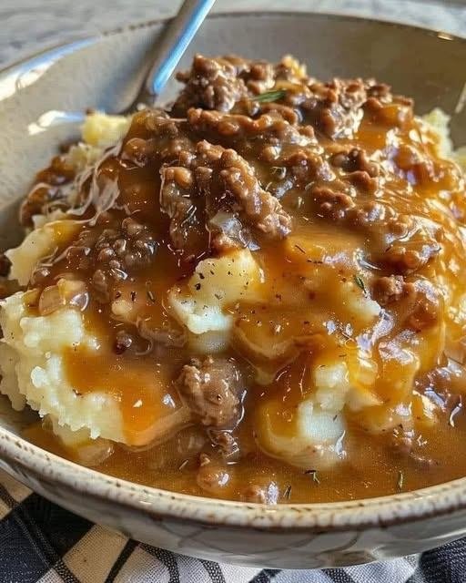 Ground Beef and Gravy Over Mashed Potatoes 591755106_879710554503117_300182653885239327_n