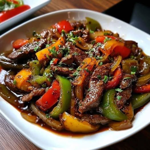 Sizzling Chinese Pepper Steak with Onions 608187352_1401493485101940_7991504071519928368_n